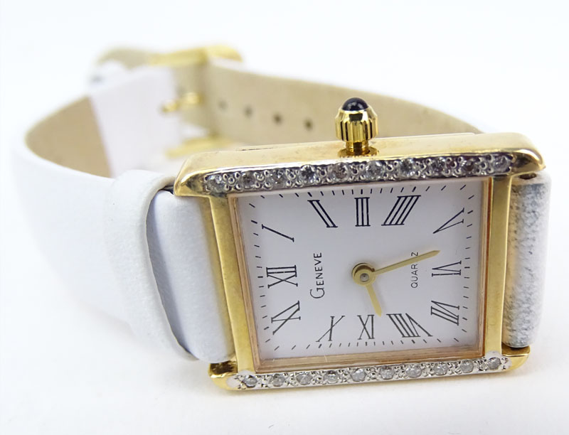 Two (2) Lady's Geneve 14 Karat Yellow Gold and Diamond Quartz Movement Watches. One (1) with 14 Karat Bracelet, One (1) with Leather Strap. 