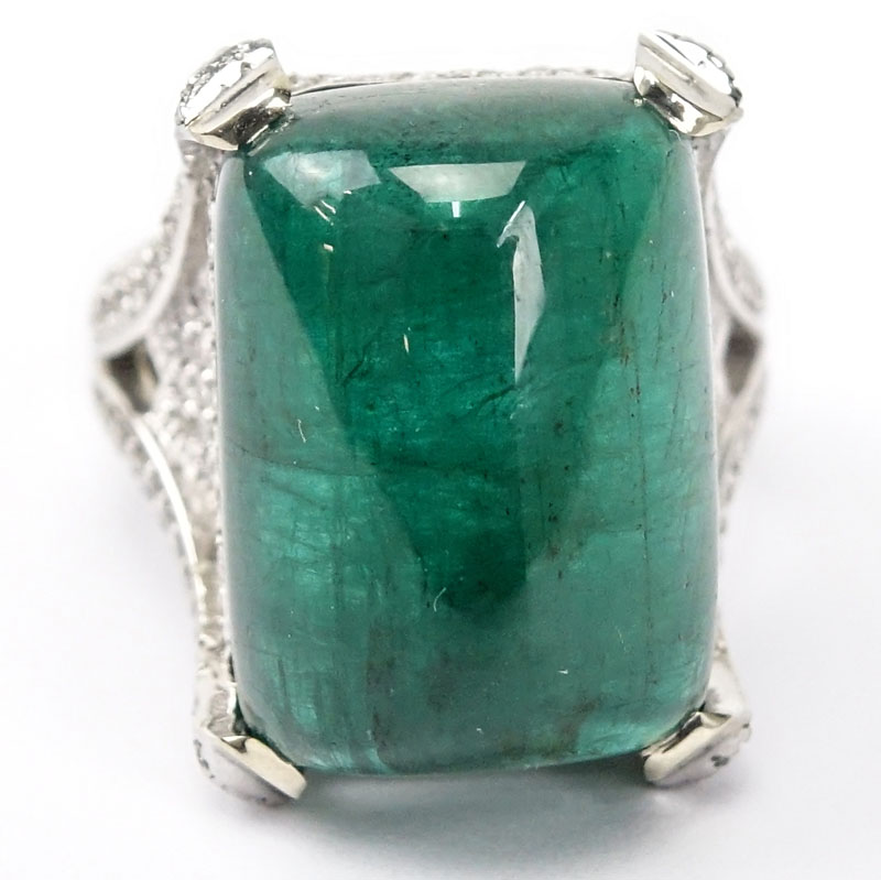 GIA Certified 25.59 Carat Sugarloaf Cabochon Emerald, Approx. 3.70 Carat Pave Set Diamond and 18 Karat White Gold Ring. 