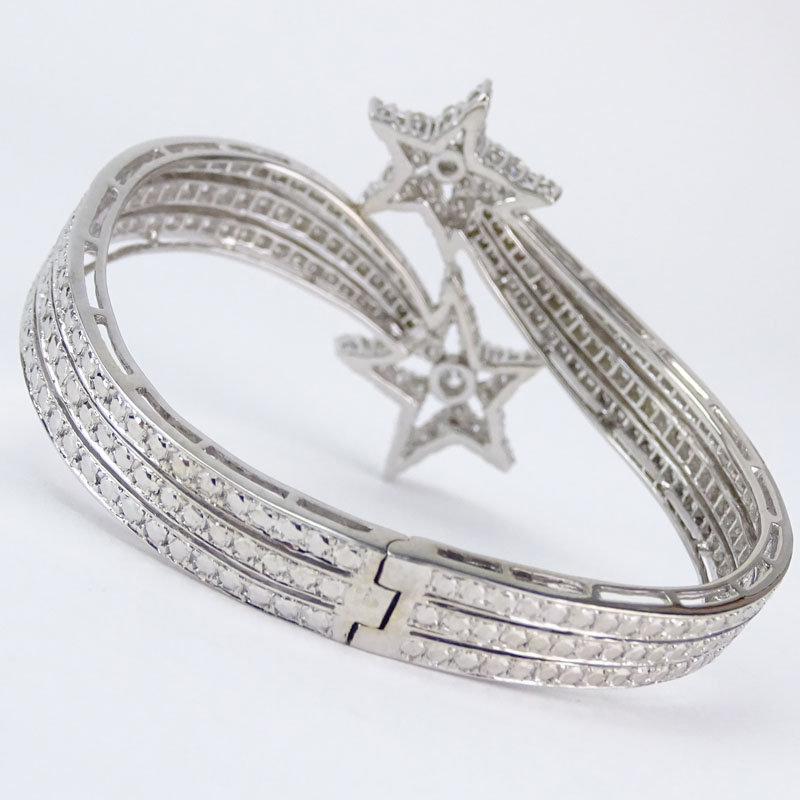 Approx. 4.24 Carat Round Brilliant Cut Diamond and 18 Karat White Gold Shooting Star Hinged Bangle Bracelet.