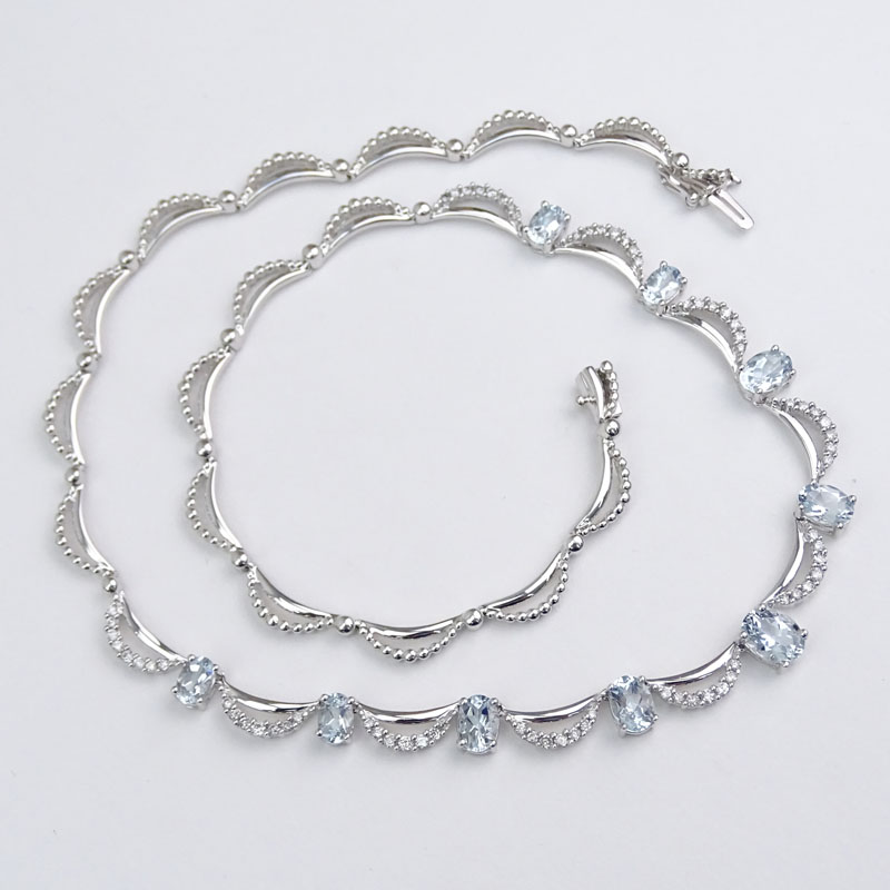 Approx. 5.0 Carat Oval Cut Aquamarine, 1.22 carat Round Brilliant Cut Diamond and 14 Karat White Gold Necklace. 