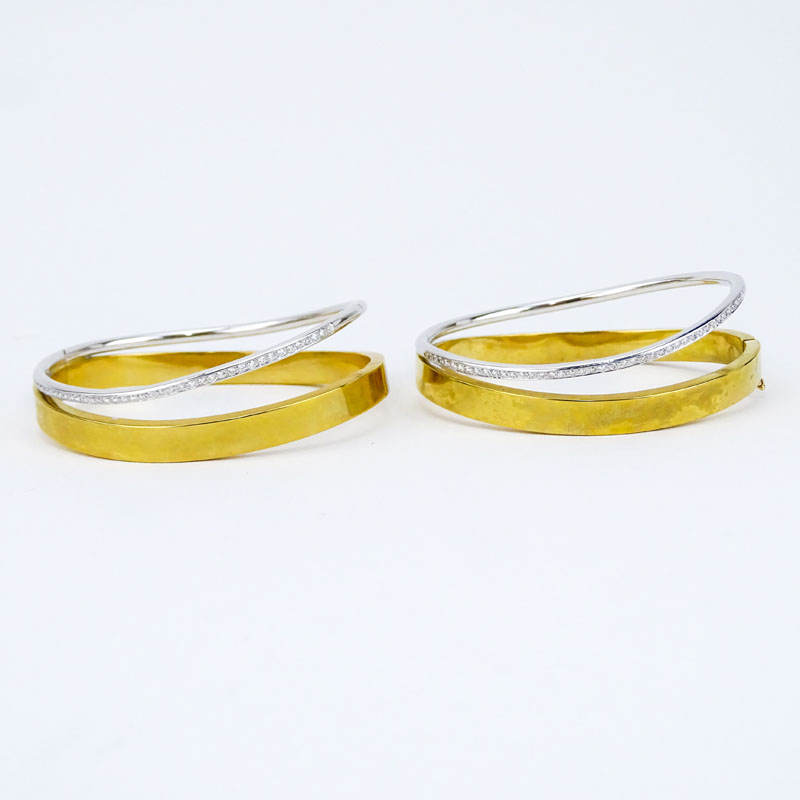 Pair of Pave Set Diamond, 18 Karat White and Yellow Gold Hinged Bangle Bracelets. 