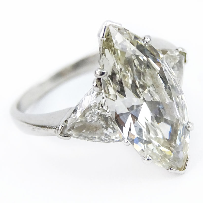 GIA Certified Vintage 3.34 Carat Marquise Cut Diamond, Trillion Cut Diamond and Platinum Engagement Ring. 