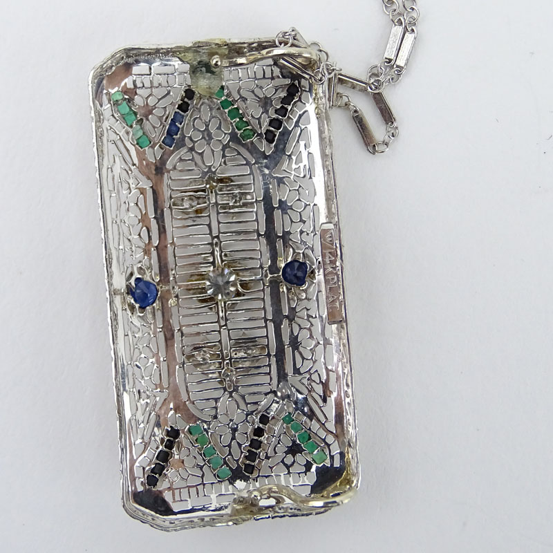 Art Deco Diamond, Sapphire, Emerald, Onyx and Platinum Filigree Bar Brooch Mounted as a Pendant with 14 Karat White Gold Chain.