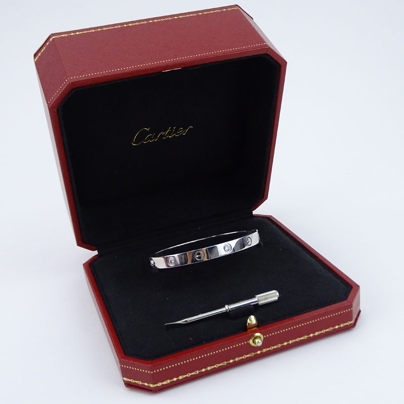 Circa 2005 Cartier 18 Karat White Gold and Six (6) Round Brilliant Cut Diamond Love Bracelet with Box, Cartier Certificate and Screwdriver. 