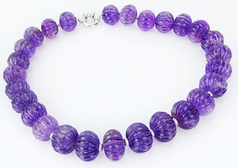 Lady's Vintage Approx. 400.0 Carat Carved Amethyst Bead and 18 Karat White Gold Necklace with Small Diamond Accents.