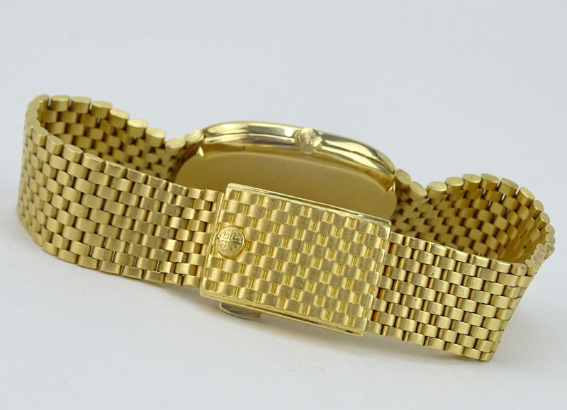 Man's Vintage Patek Philippe Gubelin Golden Ellipse 18 Karat Yellow Gold Bracelet Watch with Automatic Movement.