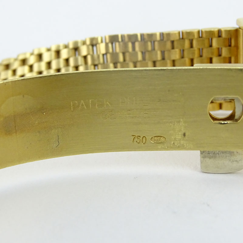 Man's Vintage Patek Philippe Gubelin Golden Ellipse 18 Karat Yellow Gold Bracelet Watch with Automatic Movement.