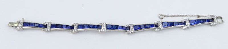 Vintage Approx. 1.50 Carat Round Brilliant Cut Diamond, Invisible Set Sapphires and 18 Karat White Gold Bracelet. 