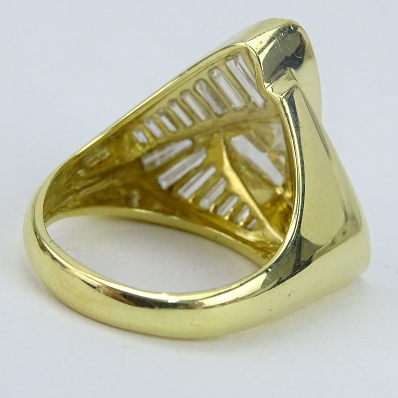 Approx. 5.45 Carat TW Trillion and Tapered Baguette Cut Diamond and 18 Karat Yellow Gold Ring.
