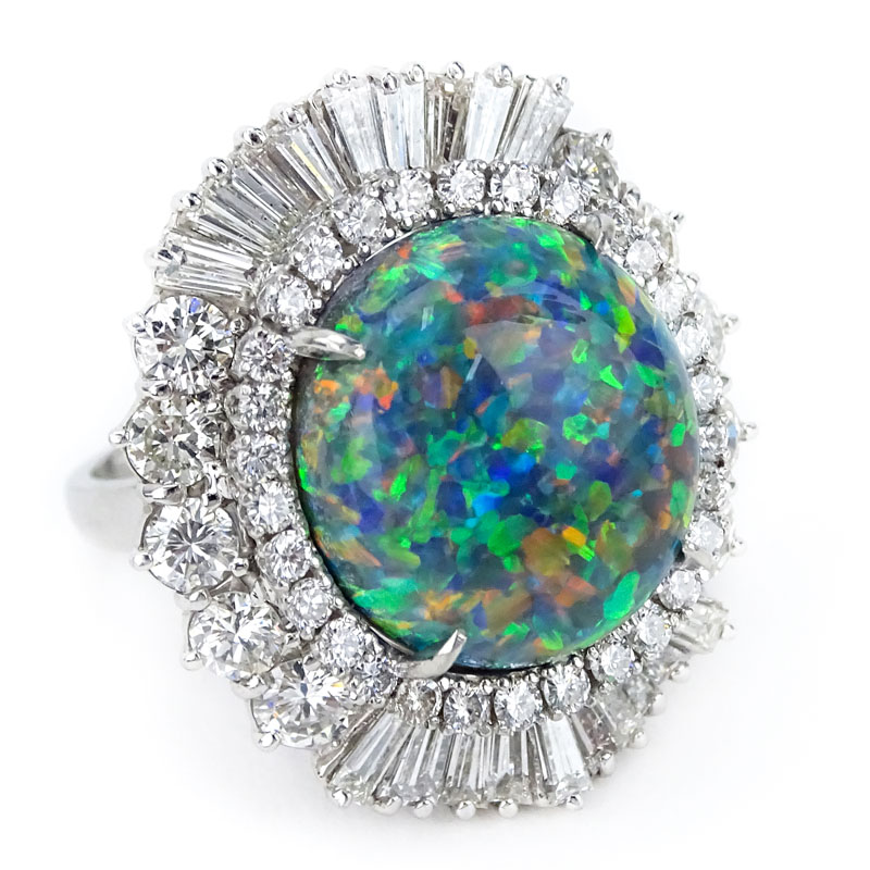 Very Fine Approx. 12.42 Carat Oval Cabochon Black Opal, Round Brilliant and Tapered Baguette Cut Diamond and Platinum Ballerina Ring / Pendant. 