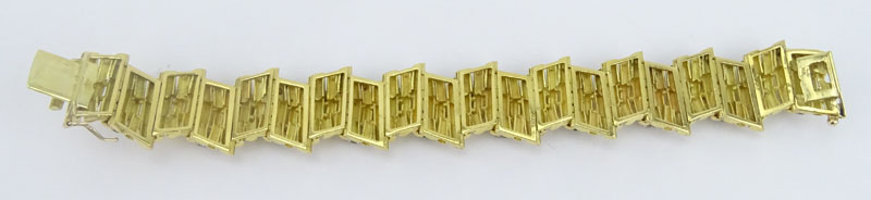 Retro Italian Approx. 2.0 Carat Round Brilliant Cut Diamond, 1.50 Carat Emerald and 18 Karat Yellow Gold Bracelet. 