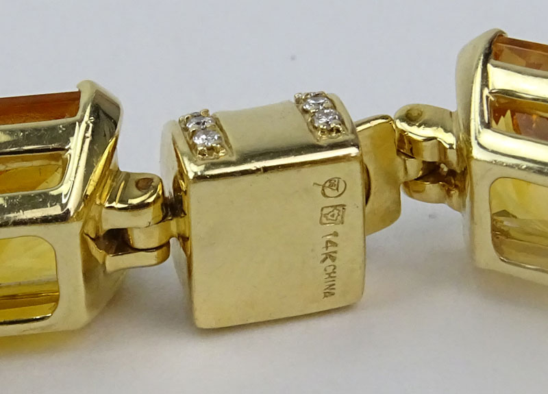 Fine Quality Eight (8) Golden Topaz, Diamond and 14 Karat Yellow Gold Bracelet. 