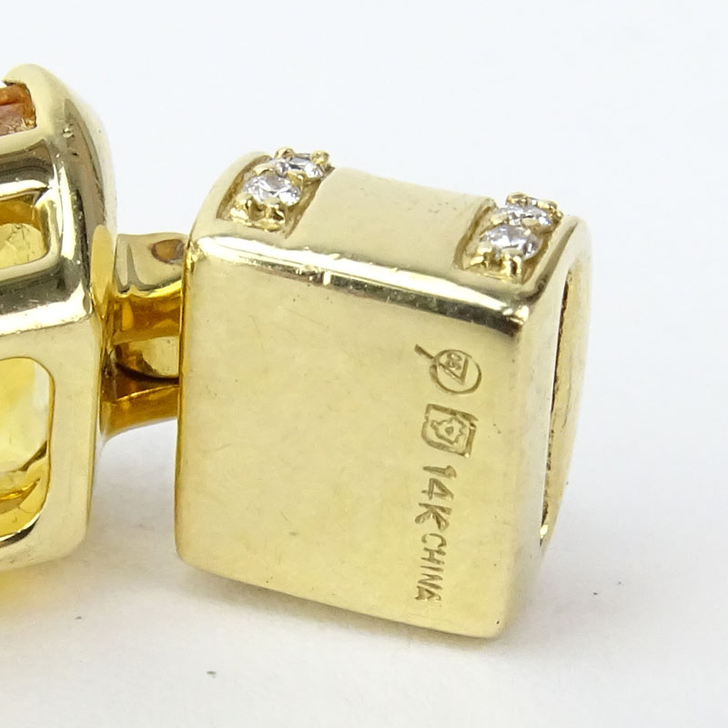 Fine Quality Eight (8) Golden Topaz, Diamond and 14 Karat Yellow Gold Bracelet. 