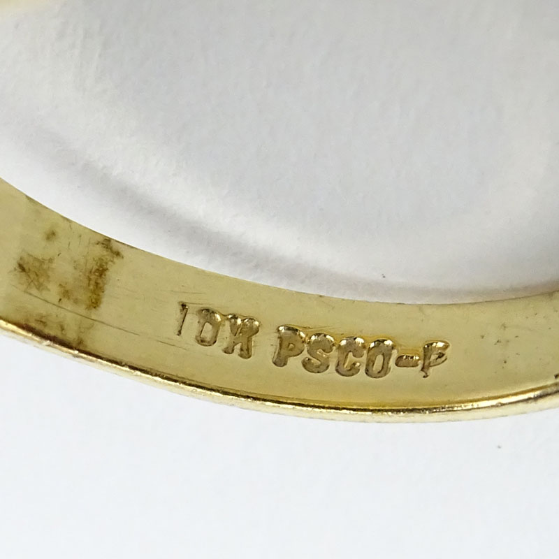 Man's Vintage Cabochon Cat's Eye Gemstone and 10 Karat Yellow Gold Ring. Stamped 10K.
