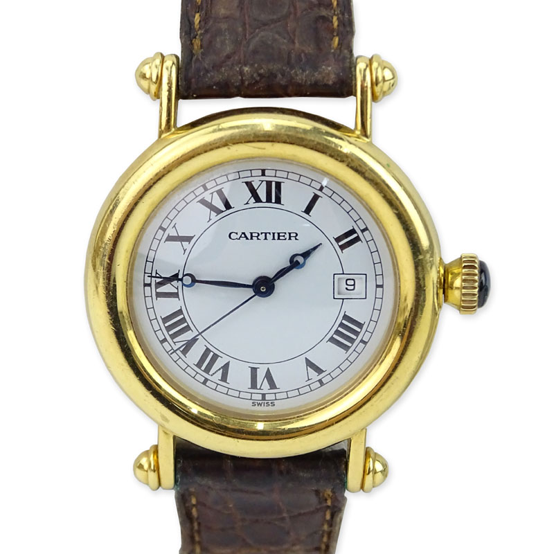 Vintage Cartier 18 Karat Yellow Gold Watch with Swiss Quartz Movement, Leather Strap and 18 Karat Yellow Gold Deployment Buckle. 