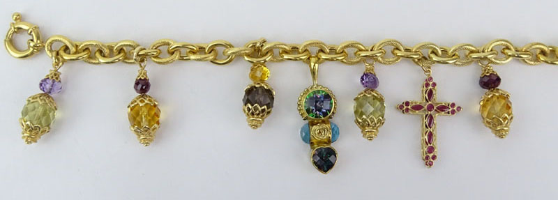 Vintage 14 Karat and 18 Karat Yellow Gold and Multi Gemstone Charm Bracelet and Ring Suite.
