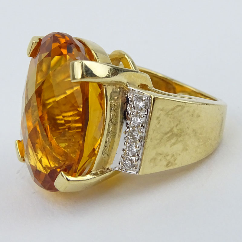 Large Oval Criss Cross Cut Citrine, Diamond and 14 Carat Yellow Gold Ring. 