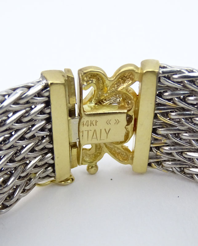 Vintage Italian 14 Karat White and Yellow Gold Bracelet with Floral Heart Accents.