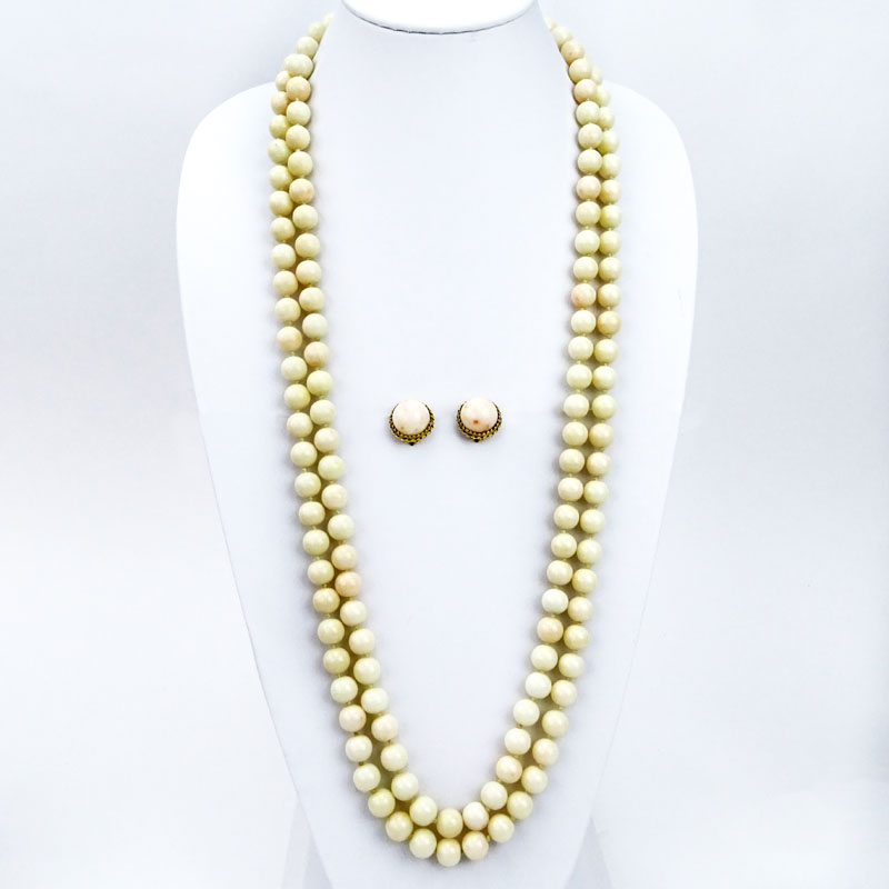 Vintage Angelskin Coral and 14 Karat Yellow Gold Double Strand Necklace and Earring Suite.