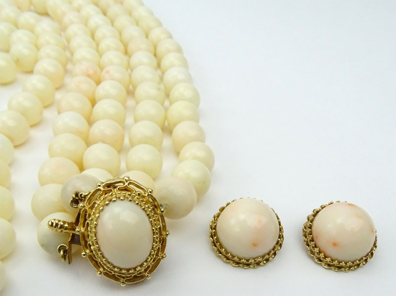 Vintage Angelskin Coral and 14 Karat Yellow Gold Double Strand Necklace and Earring Suite.
