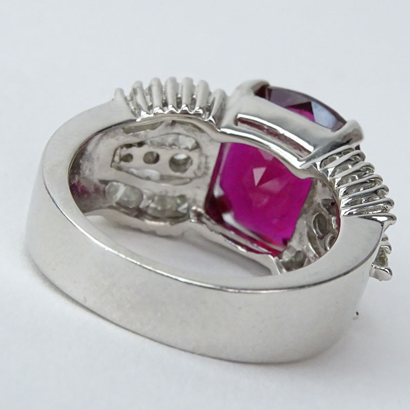 Diamond, 14 Karat White Gold and Oval Cut Synthetic Ruby Ring. 