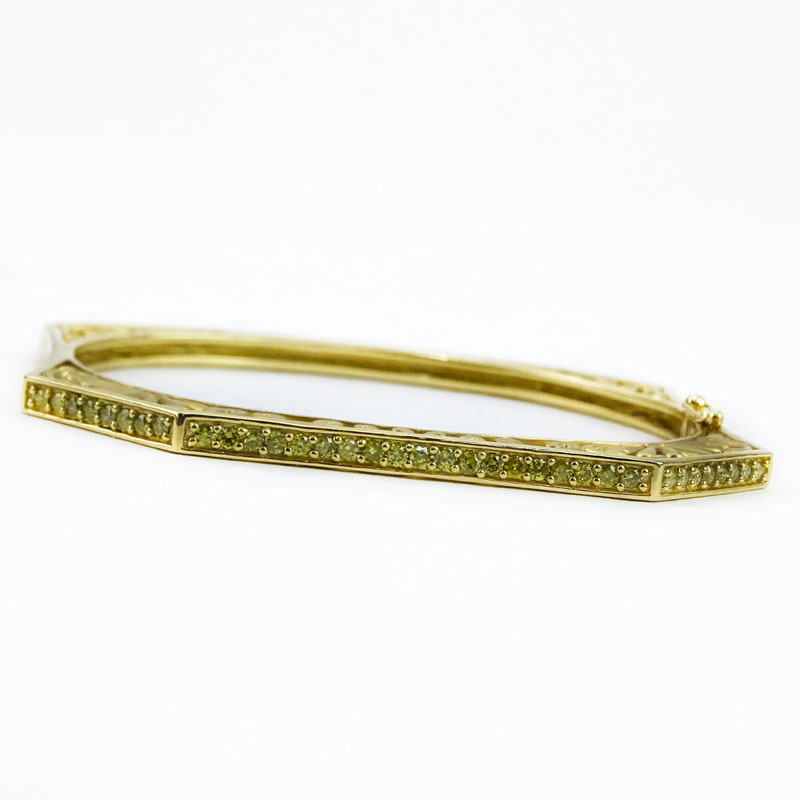 Fine 14 Karat Yellow Gold, Round Cut Fancy Yellow Diamond Openwork Hinged Cuff Bracelet. 