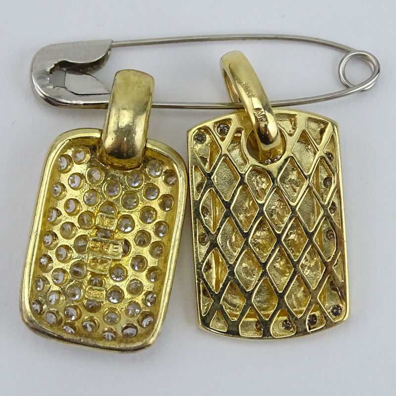 Vintage 14 Karat Yellow Gold and Diamond Pendant along with Sterling and CZ Pendant.