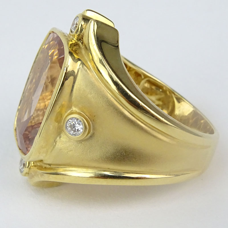 Large Cushion Cut Morganite, Round Brilliant Cut Diamond and 14 Karat Yellow Gold Ring. 