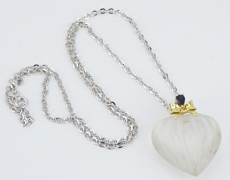 Vintage Crystal Heart Pendant Necklace with 14 Karat yellow Gold and Sapphire Accents to Pendant, 14 Karat White Gold Chain. 