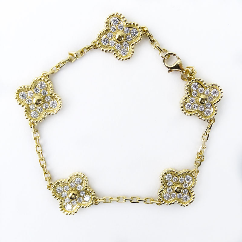 Van Cleef & Arpels Style Diamond and 18 Karat Yellow Gold "Alhambra" Bracelet. Stamped 750 to clasp. 