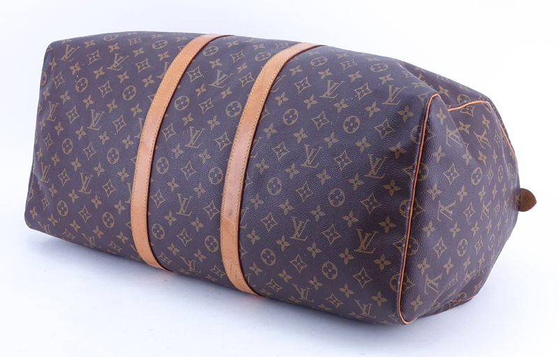Louis Vuitton Monogram Keepall Duffel Bag With Luggage Tag. Canvas interior.