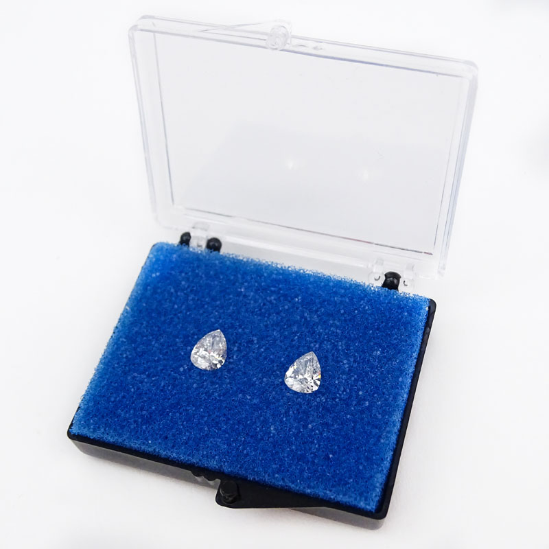 Two (2) GIA Certified Antique Pear Shape Diamonds.