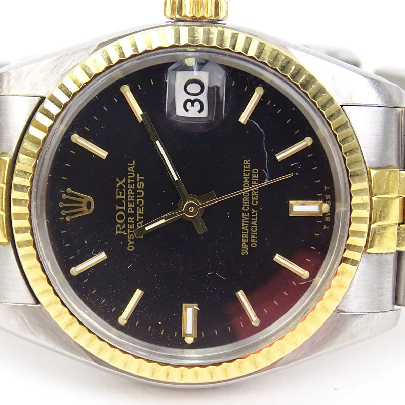 Vintage Rolex Datejust 18K Yellow Gold and Stainless Steel Jubilee Black Dial Watch, 31mm Case. 