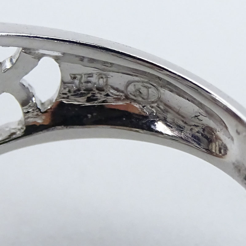 Approx. 4.07 Carat Oval Cut Sapphire, .47 Carat Round Brilliant Cut Diamond and 18 Karat White Gold Ring. 