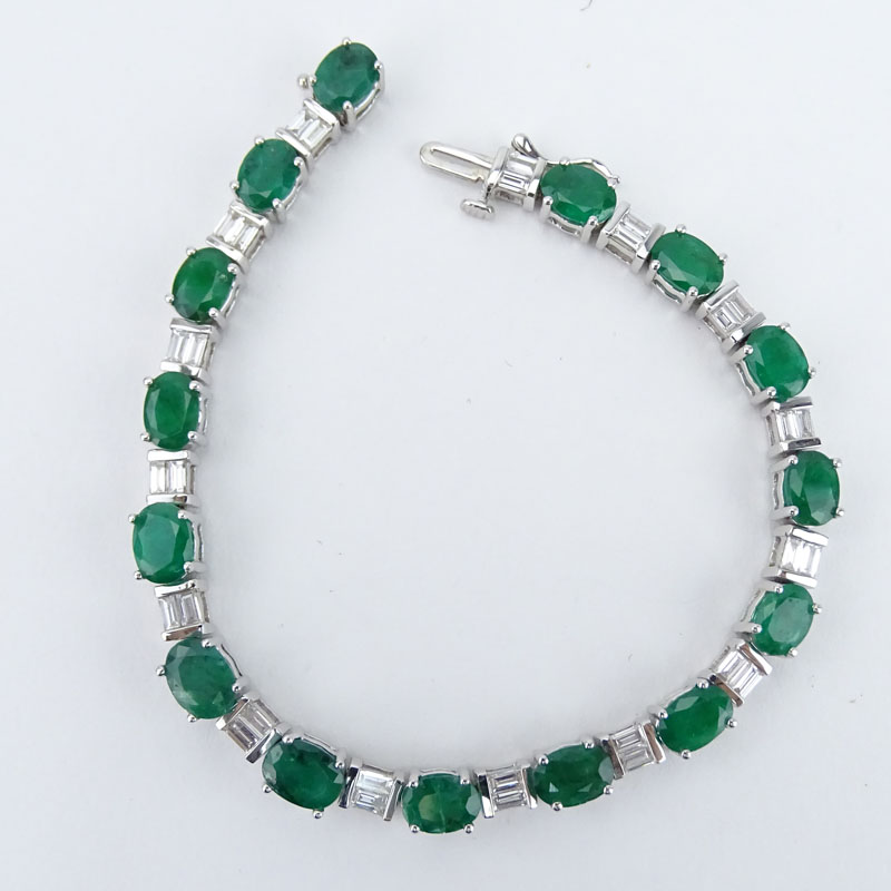 Approx. 12.48 Carat Oval Cut Emerald, 1.80 Carat Baguette Cut Diamond and 14 Karat White Gold Bracelet. 