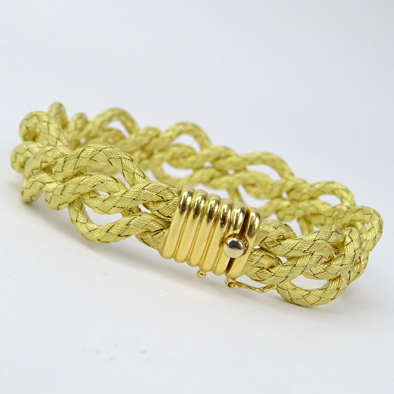 18 Karat Yellow Gold Four Strand Woven Rope Bracelet.
