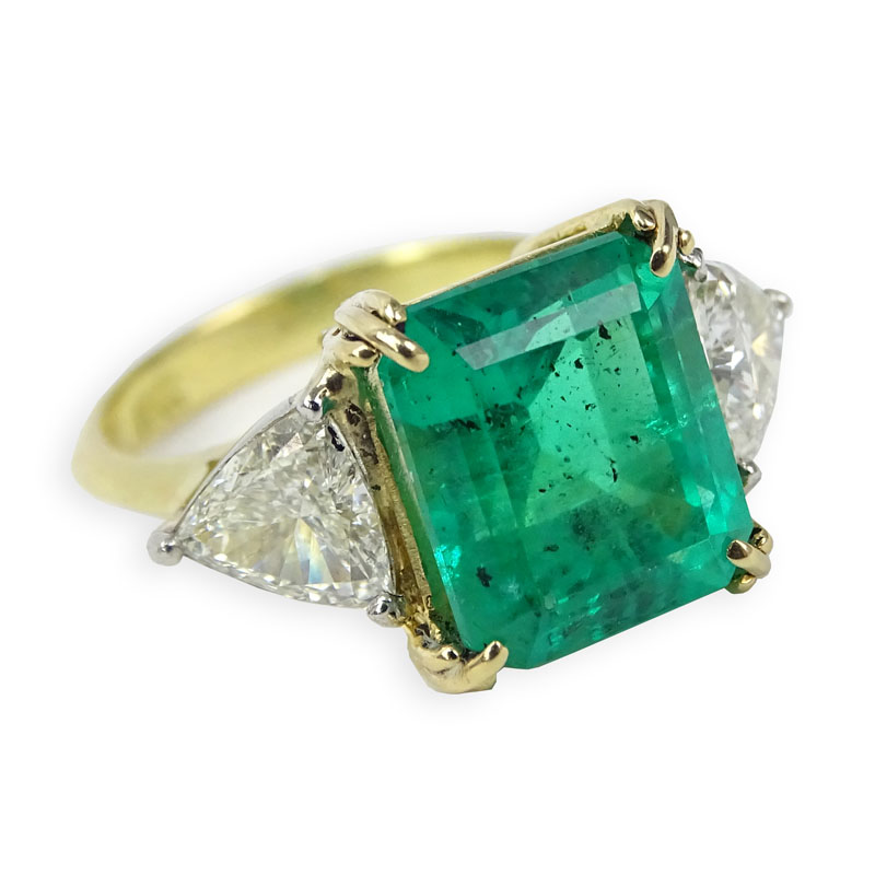 Vintage Approx. 4.98 Carat Emerald, .75 Carat Trillion Cut Diamond and 18 Karat Yellow Gold Ring. 