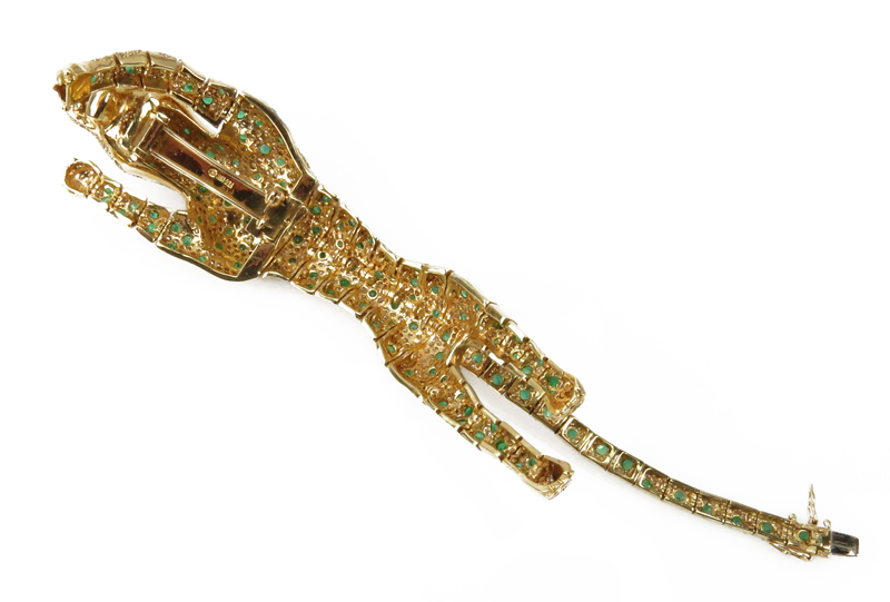 Large Vintage Cartier Style Articulated 18 Karat Yellow Gold Panther Bracelet / Brooch Accented throughout with Pave Set Diamonds and Emeralds and Ruby Eyes.