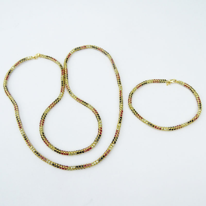 Vintage 18 Karat Yellow Gold Round Snake Link Necklace and Bracelet Suite Set throughout with Diamonds, Rubies and Sapphires. 