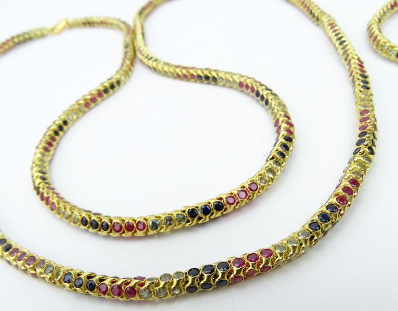 Vintage 18 Karat Yellow Gold Round Snake Link Necklace and Bracelet Suite Set throughout with Diamonds, Rubies and Sapphires. 