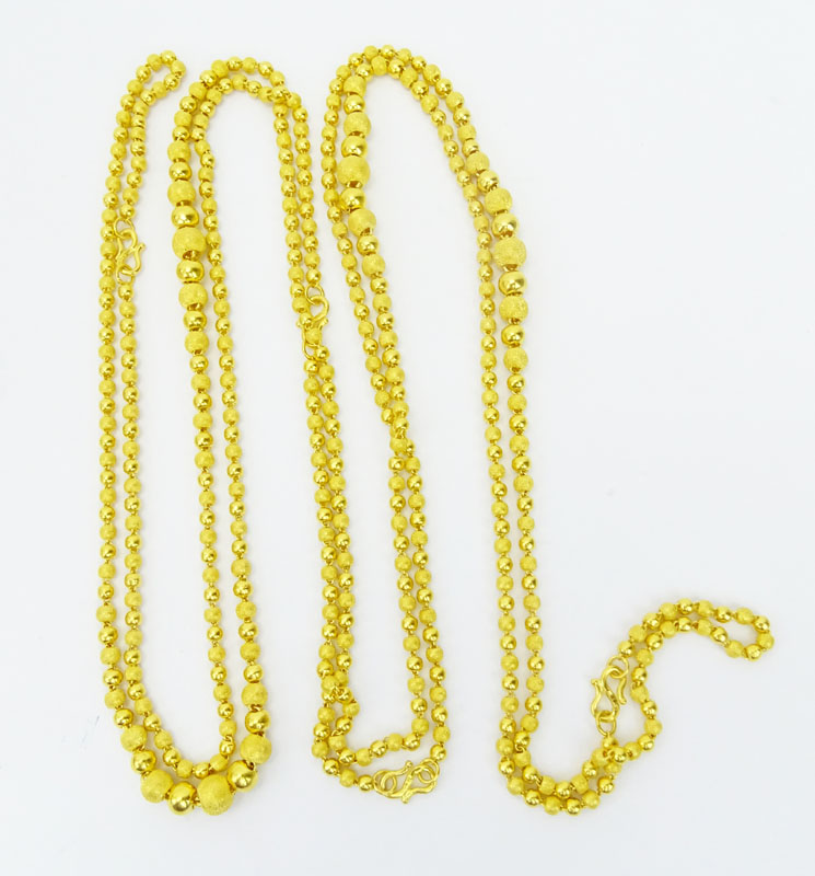 Vintage Long 24 Karat Pure Yellow Gold Graduated Bead Single Strand Necklace.