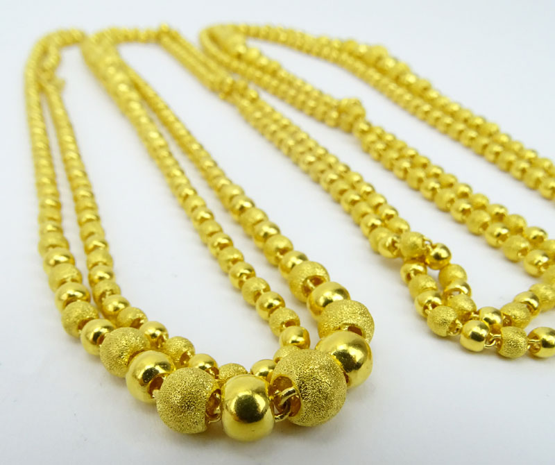 Vintage Long 24 Karat Pure Yellow Gold Graduated Bead Single Strand Necklace.