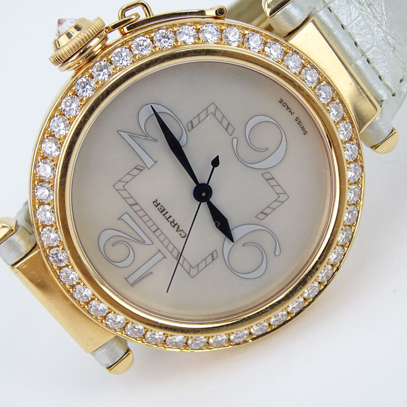 Cartier Pasha 18 Karat Rose Gold and Diamond Swiss Automatic Movement Watch with Mother of Pearl Dial and Crocodile Strap.