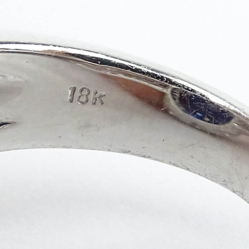 24.14 Carat Oval Cut Royal Blue Sapphire, 2.08 Carat Round Brilliant Cut Diamond and 18 Karat White Gold Ring. 