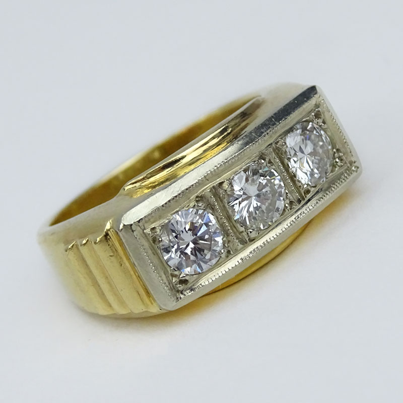 Men's Vintage Round Brilliant Cut Diamond and 14 Karat Yellow Gold Three Stone Ring.