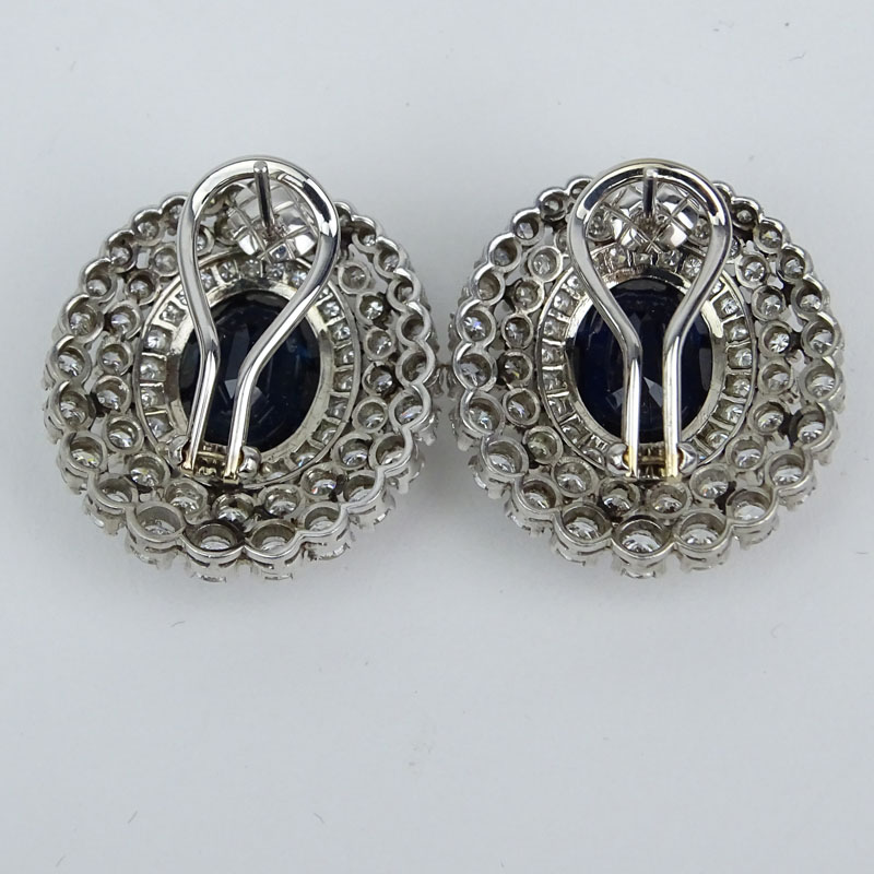 Approx. 12.0 Carat Oval Cut Sapphire, 7.50 Carat Round Brilliant Cut Diamond and Platinum Earrings. 
