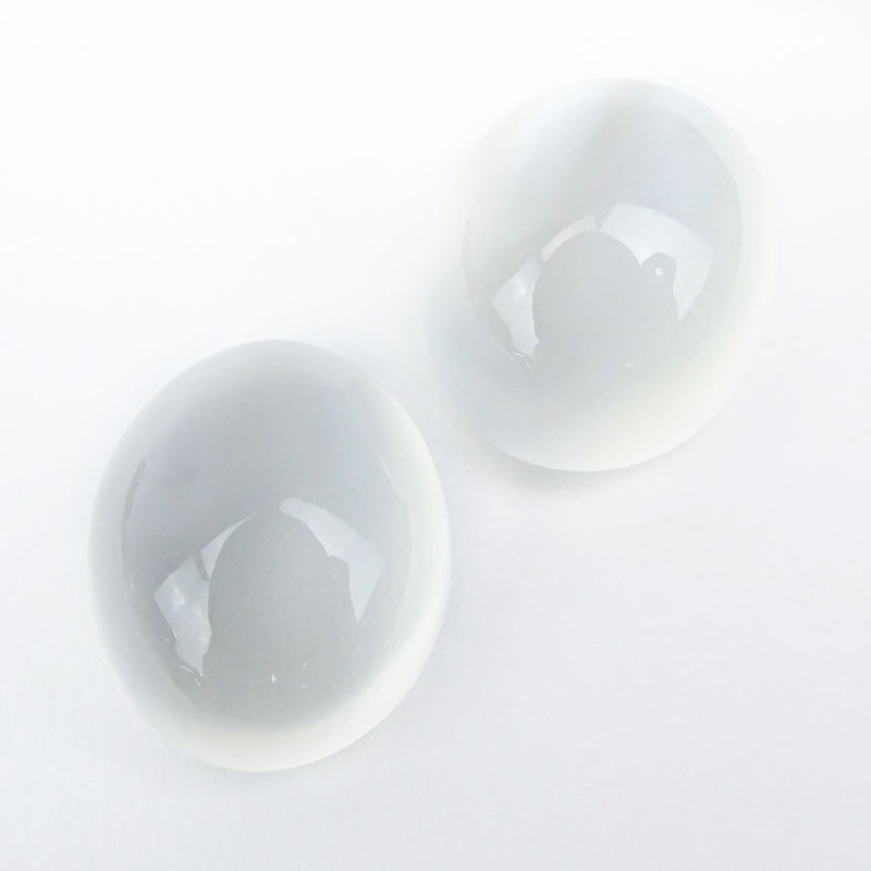 Two (2) Gem Quality Oval Cabochon Moonstones, Approx. 20.80 Carats TW. Very strong cat's eye effect, VVS1 clarity. 