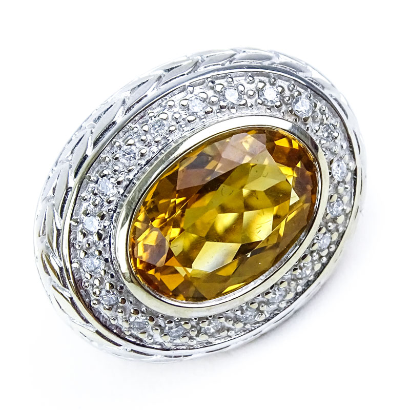 Oval Cut Citrine, Diamond and 14 Karat Yellow Gold Ring. 