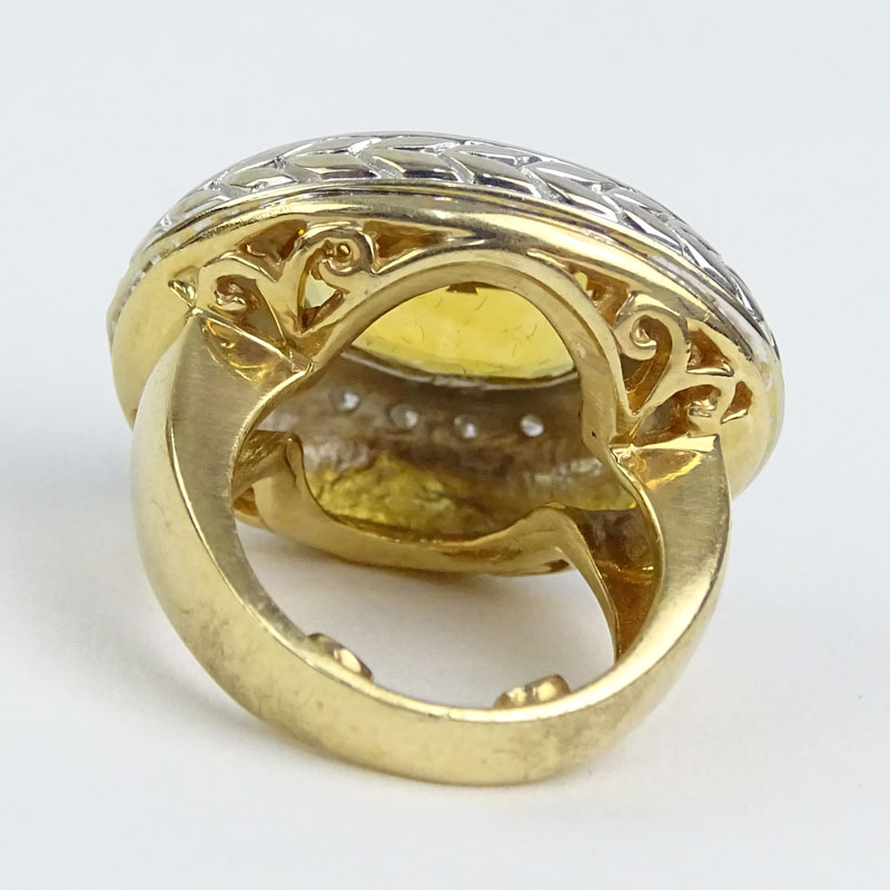 Oval Cut Citrine, Diamond and 14 Karat Yellow Gold Ring. 