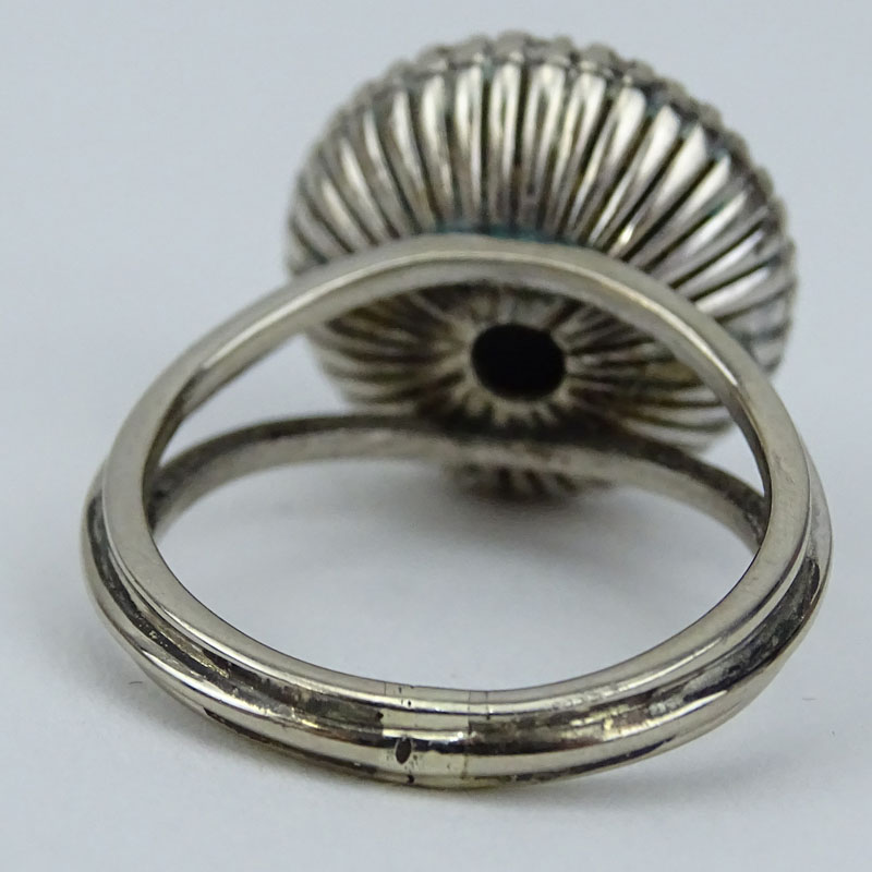 Vintage Round Brilliant Cut Diamond and 14 Karat White Gold Starburst Ring.